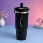 Personalized black insulated tumbler with engraved name and straw lid