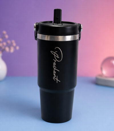 Personalized black insulated tumbler with engraved name and straw lid